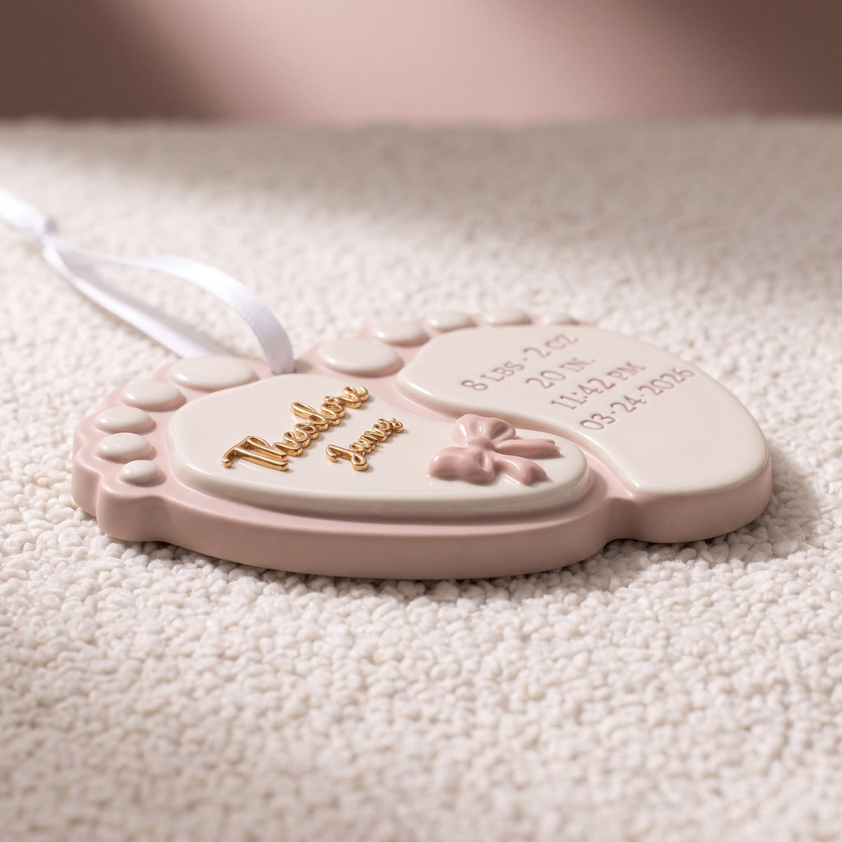 Close-up of raised baby footprints